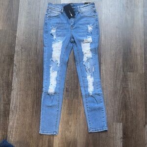 Fashion Nova Light Blue Ripped Skinny Jeans